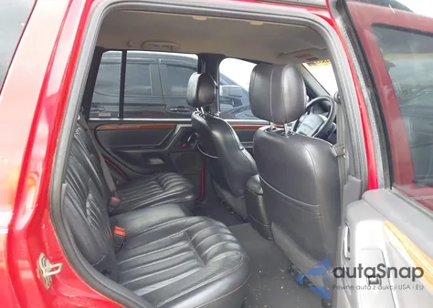 1999 Jeep Grand Cherokee Limited из США, поврежденный, VIN 1J4GW68N3XC544902